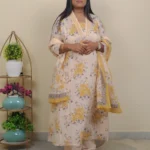 vibrant yellow floral bouquets three-piece Anarkali suit